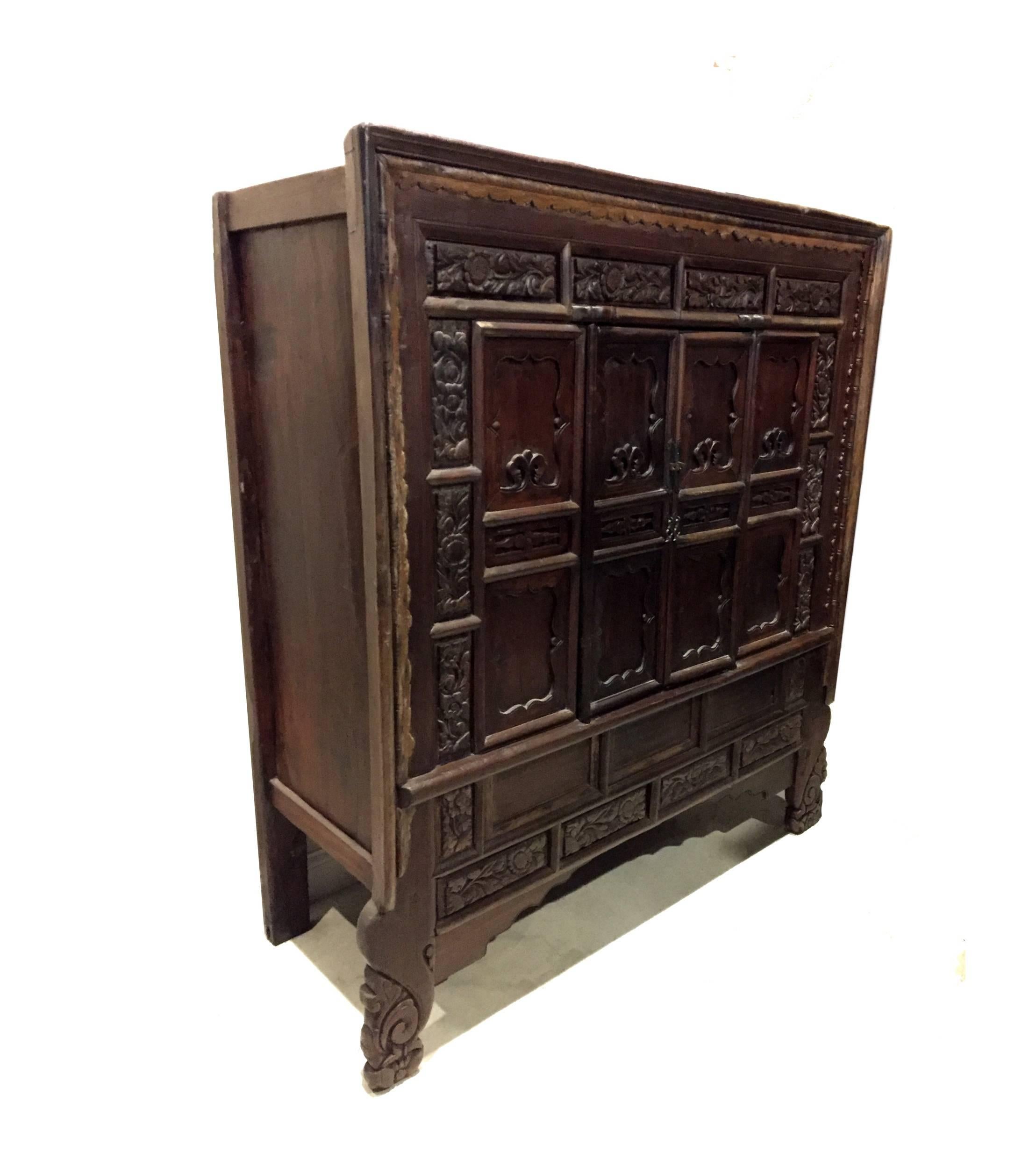A huge General's armoire from Shan Xi province, China's ancient frontier and trade post. Commanding at over 5' wide with solid structure and bold features, this exceptional piece demonstrates all the trademarks of northern Chinese furniture. The