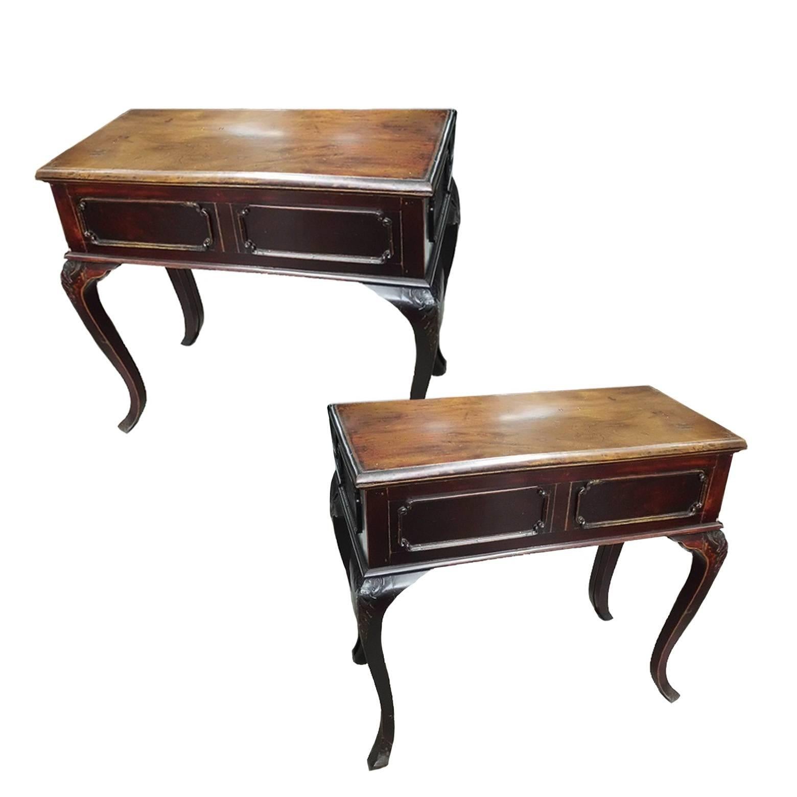 A pair of beautiful tables with solid, single board tops and elegant flared legs. Each table has a full depth drawer on the side. Legs carved with a foliage pattern. The tables can be put together to form a square table, very convenient shall a game