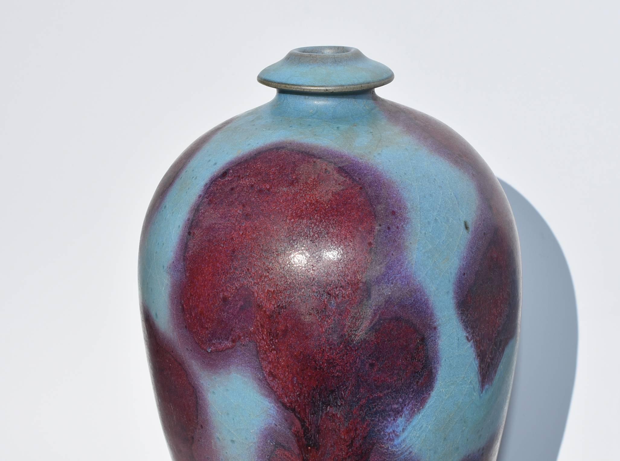 A splendid Jun ware porcelain Mei vase. Jun is one of the most important kilns in China originated in Tang dynasty that is known for producing porcelains with rare, one of a kind colors. Porcelain go into the kiln colorless, but emerges with