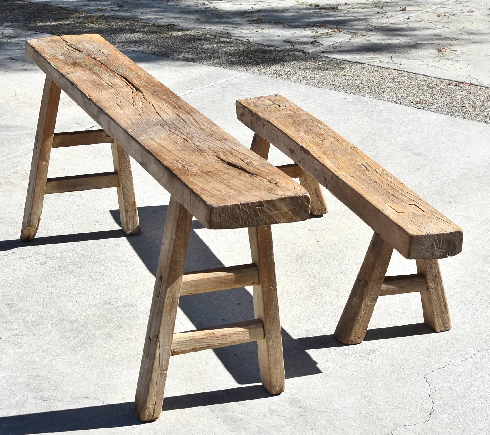 Two beautiful country benches that are full of rustic charm. The all original antique pieces are from Northern China's Shan Dong province. Both have 2