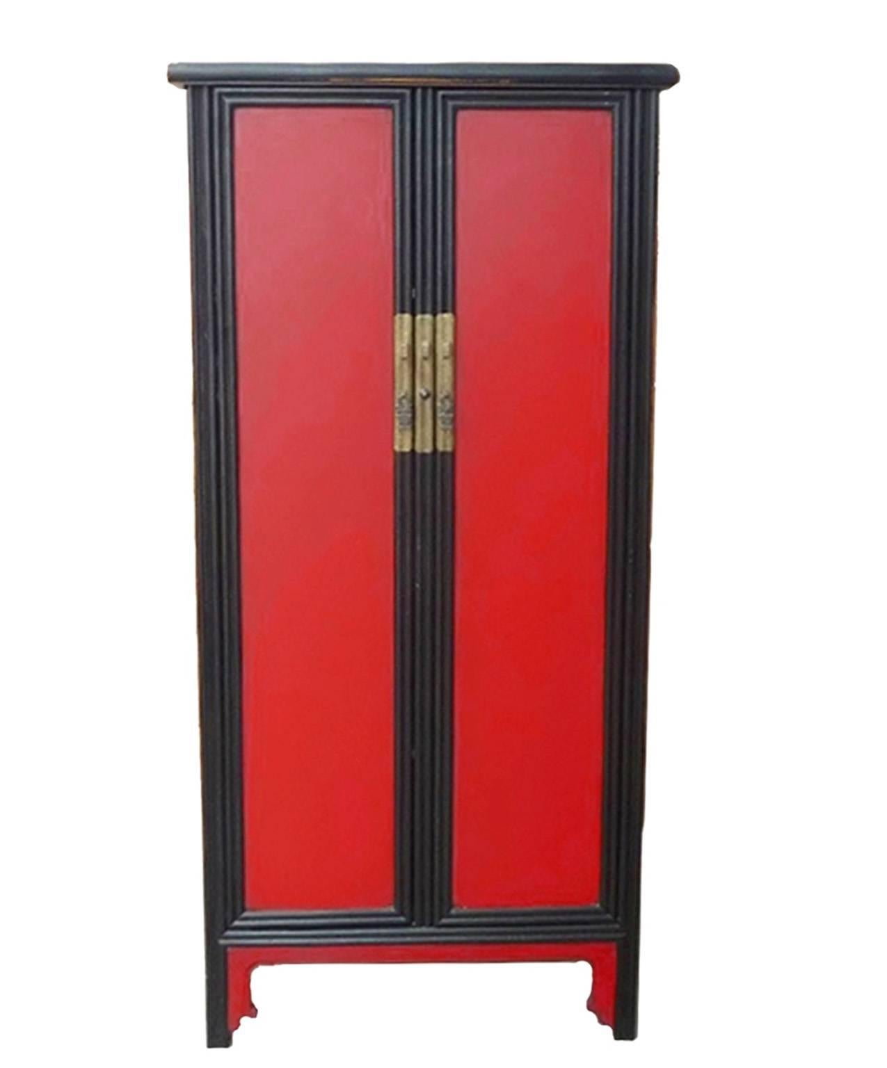 Incredible value! Price is for both cabinet and desk! This beautiful cabinet is a great new example of Ming Dynasty's simple and elegant design in furniture making. Contrasting red and black color makes it a fantastic focal point. Removable center