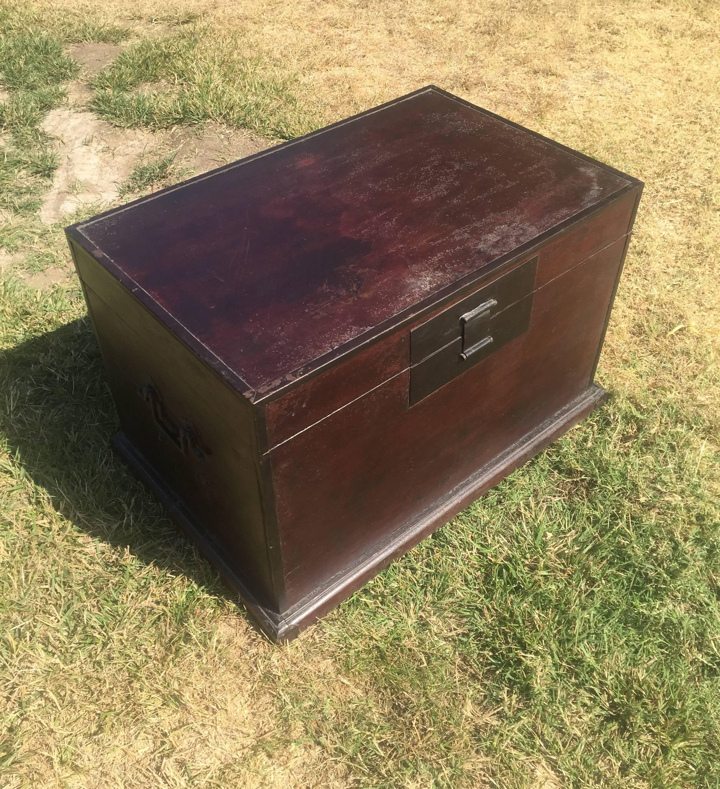 This beautiful trunk is all original, with gorgeous reddish interior and custom northern style bronze hardware. Reinforced base and corners. Superb original top and exterior display amazing crackled patina. 

Fantastic as a coffee table or at foot