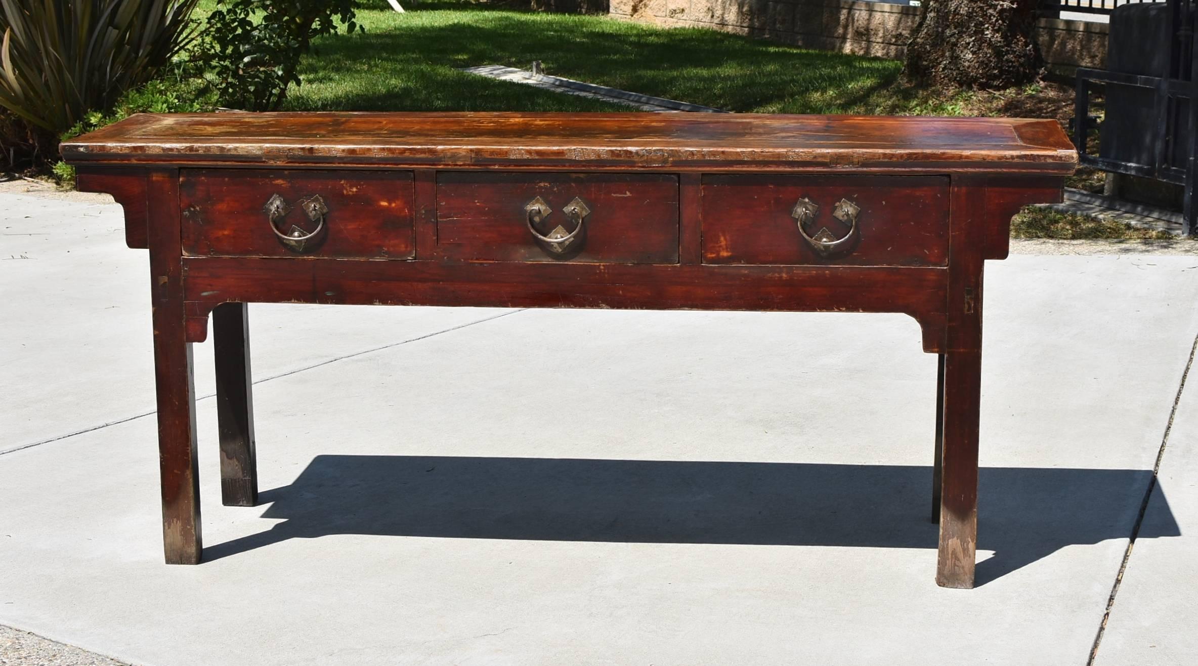 19th century table from northern China's Shan Xi province. The table has three full-length drawers. The tabletop used the ingenious 