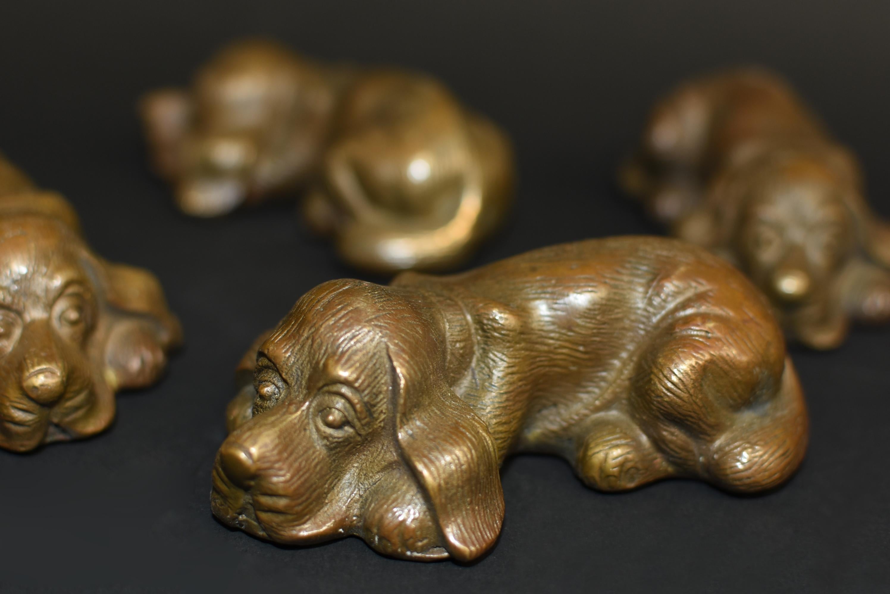 Set of Four Bronze Puppy Dog Paperweights 1