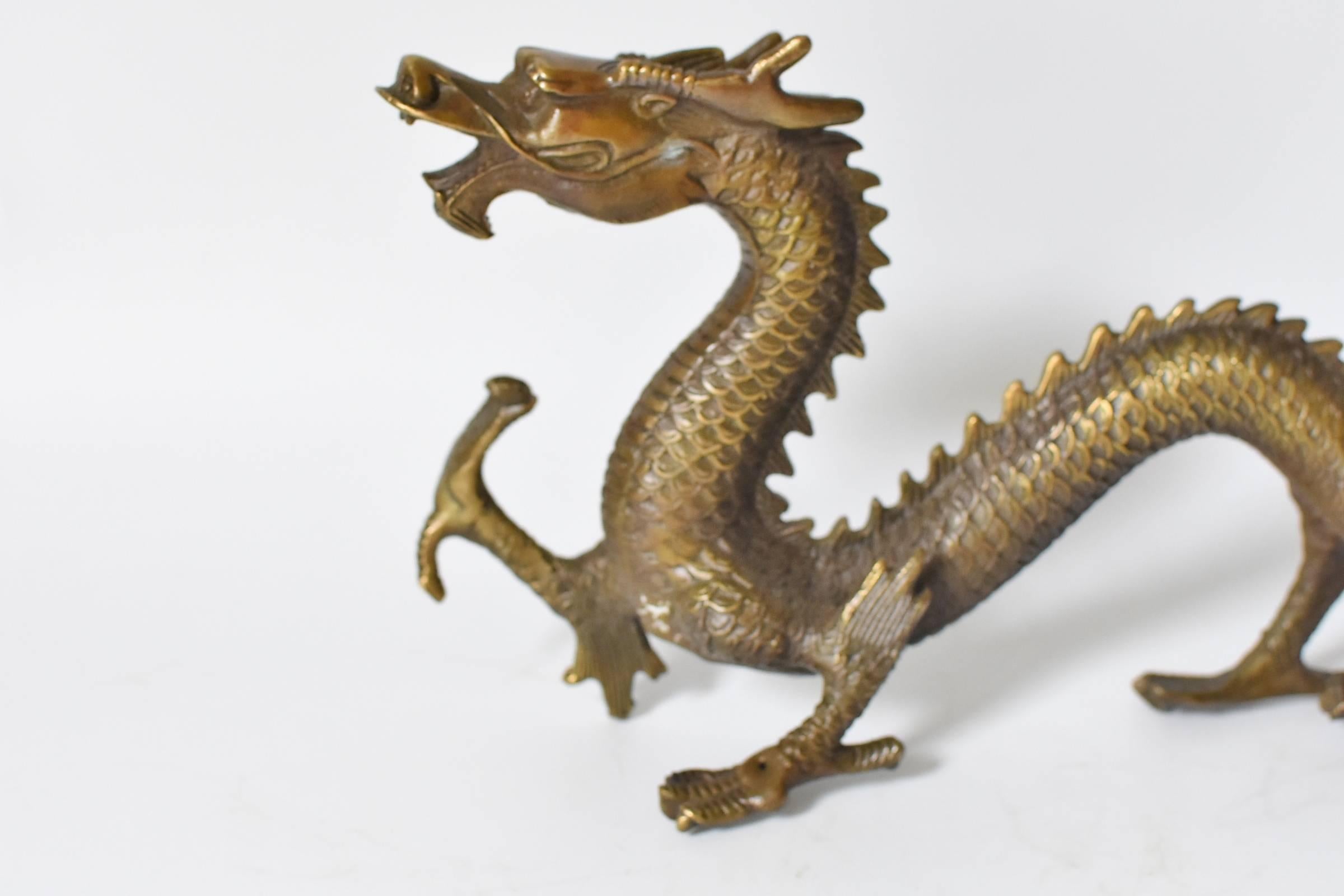 The dragon is the most important symbol in Chinese culture. A sign used by the Emperors, it represents power, leadership and prosperity. This wonderful sculpture captures the dragon in motion. Fine details of scale, paws and horns reflect the