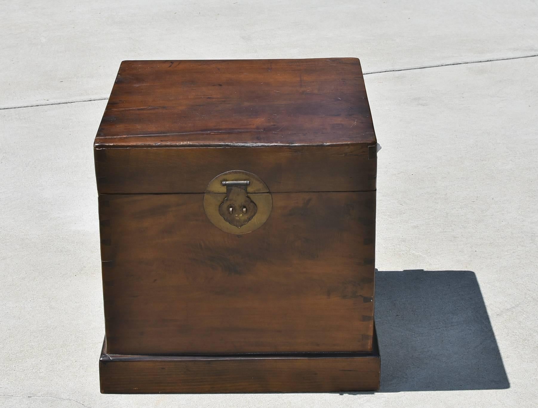 A beautiful 20th century Chinese trunk made of solid wood, using tenons, mortises and exquisite dovetails joinery. Solid brass hardware. Ming style. A wonderful piece to be used as a storage trunk or a table.

 