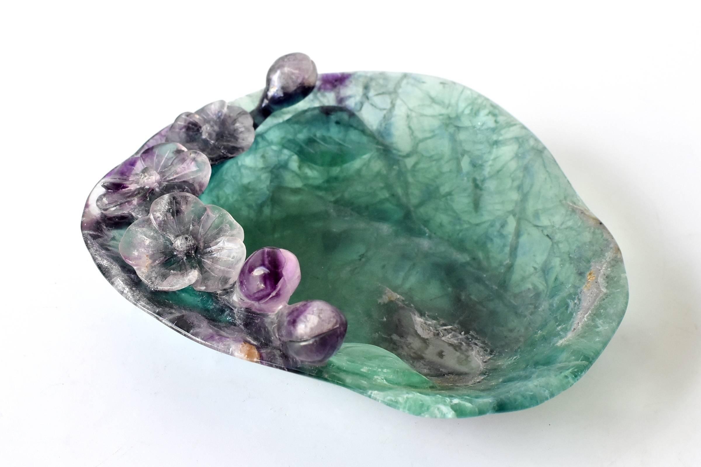 This one of a kind violet Fluorite dish is stunning. One of the most collectible and highly sought after crystals in the world, treasured by mineralogists and metaphysical healers, Fluorite is an extraordinary creation of nature. Luminous and