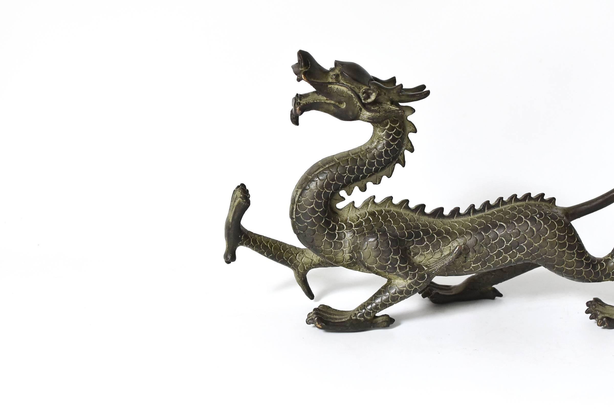 The dragon is the most important symbol in Chinese culture. A sign used by the Emperors, it represents power, leadership and prosperity. This wonderful sculpture captures the dragon in motion. Fine details of scale, paws and horns reflect the