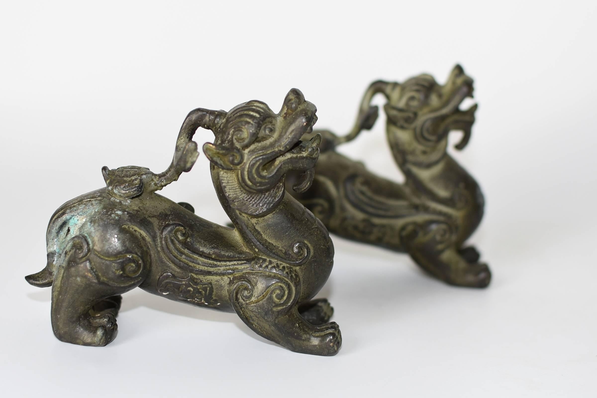 A pair of beautiful bronze Pixiu dragons. These are mythical beasts believed to bring tremendous wealth. Fine craftsmanship and vivid expressions. Detailed works throughout. They are fantastic desk accessories and makes great paperweights.



 
