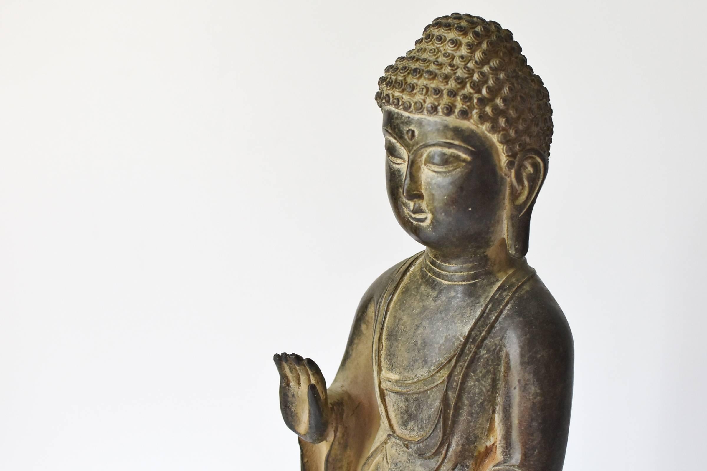 standing bronze buddha