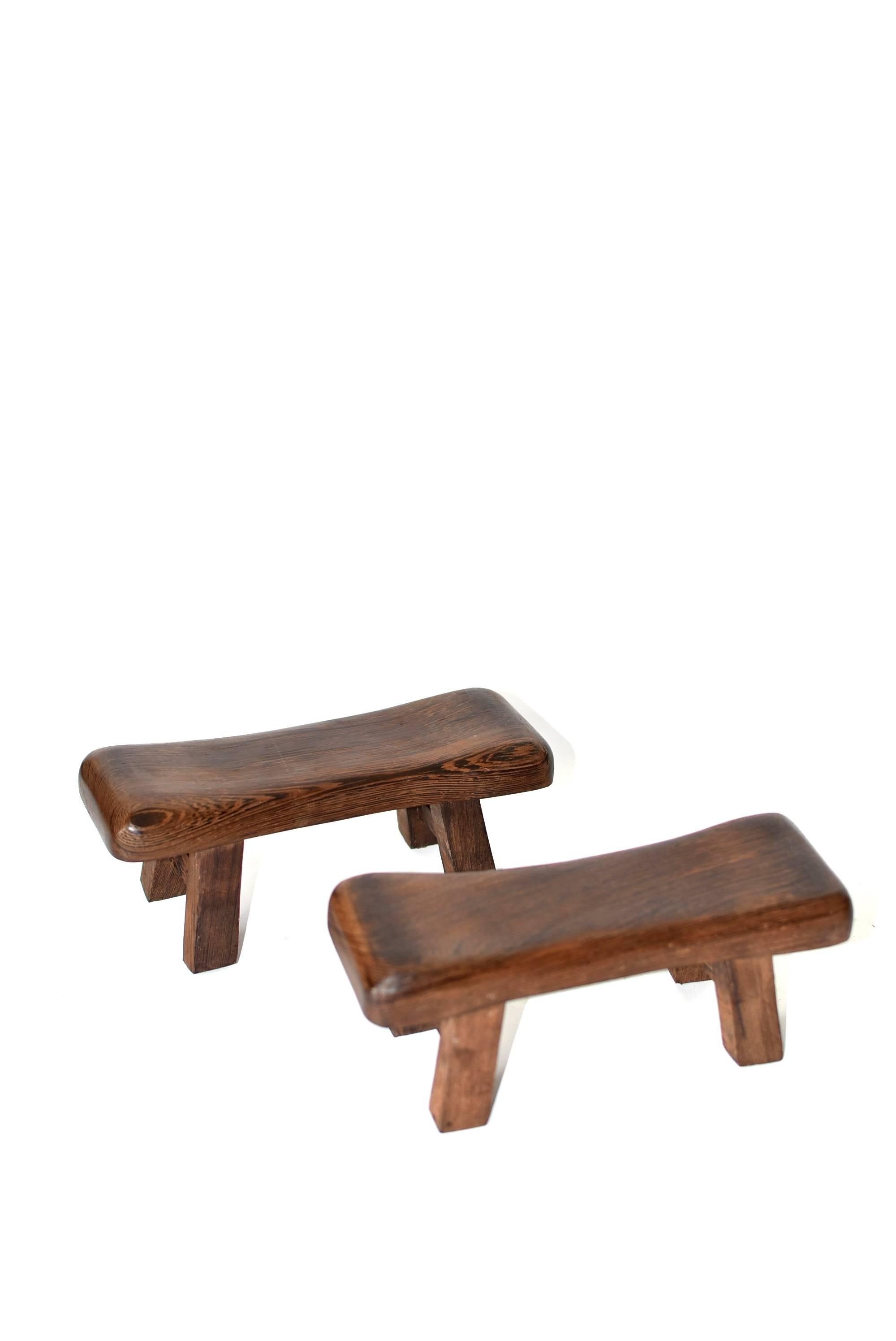 Beautiful miniature stools are made of the most spectacular wenge wood. This type of wood has very distinctive wood grains. It is highly prized for its density and scenic, romantic grain pattern. These stools can be used as headrest, hand rests in