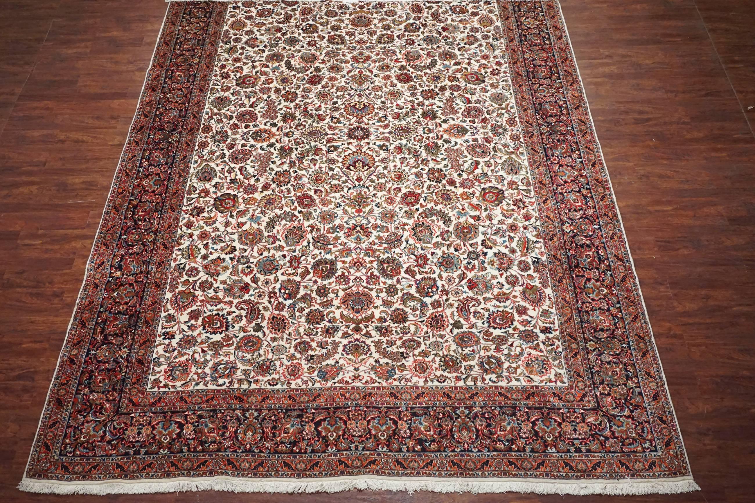 Fine wool and silk Persian Tabriz rug

circa 2000

Measures: 11' x 15' 8