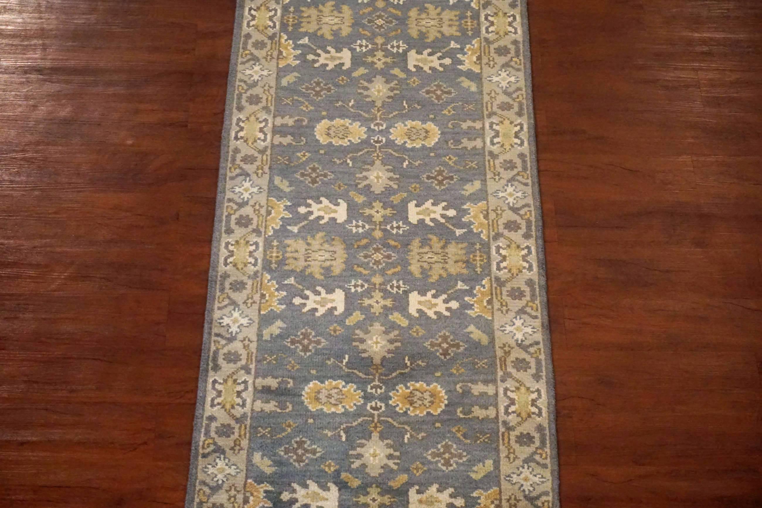 Grey hand-knotted Oushak runner.

2015

Measures: 2'7