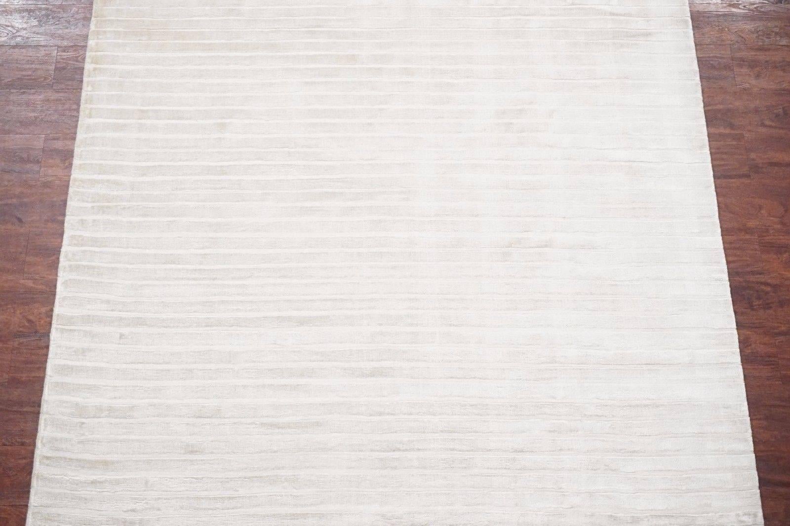 Modern cream colored bamboo silk rug

2015

Measures: 5' 5