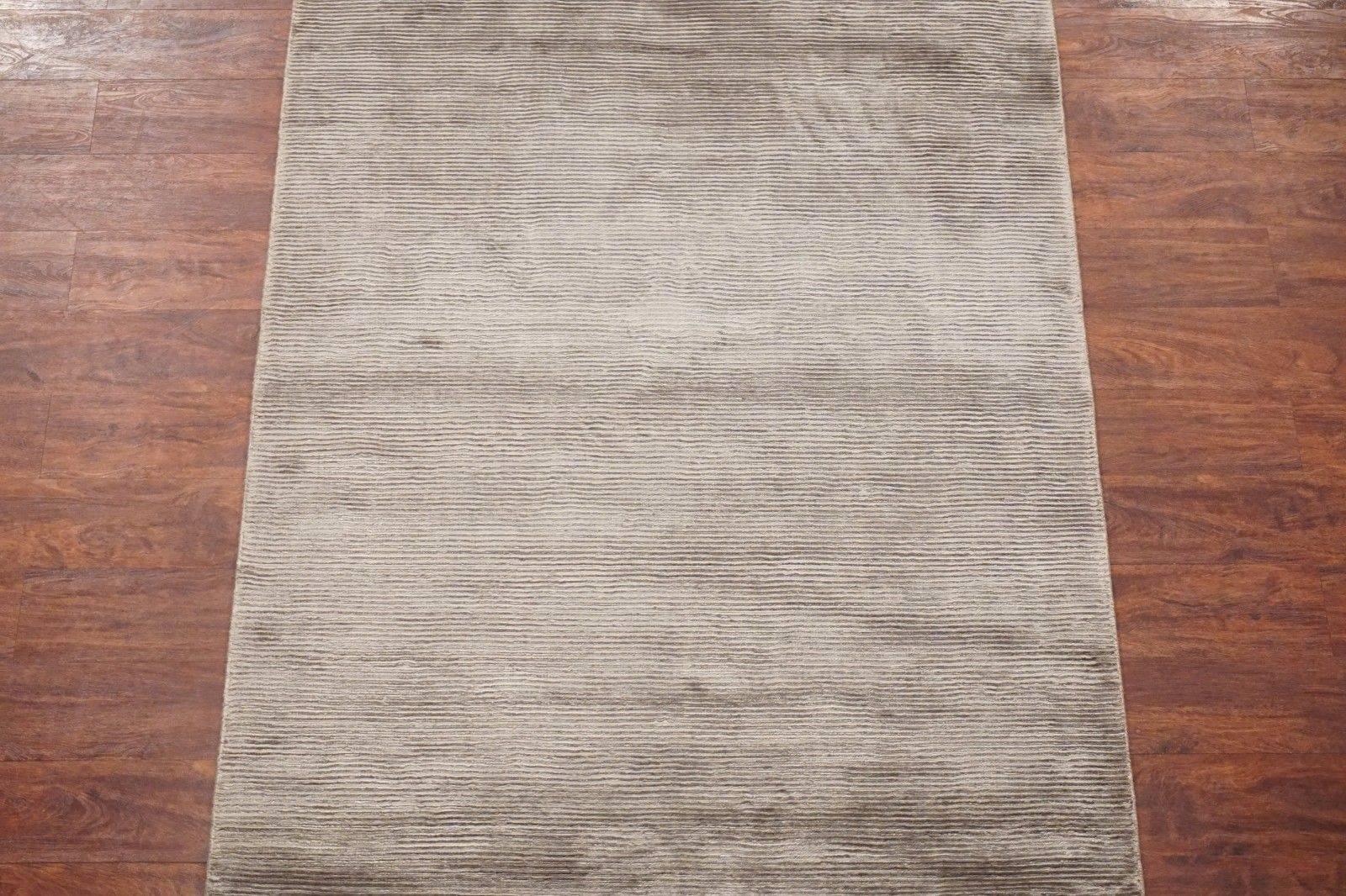 Solid bamboo silk area rug with striped design

2015

Measures: 4' x 6' 1