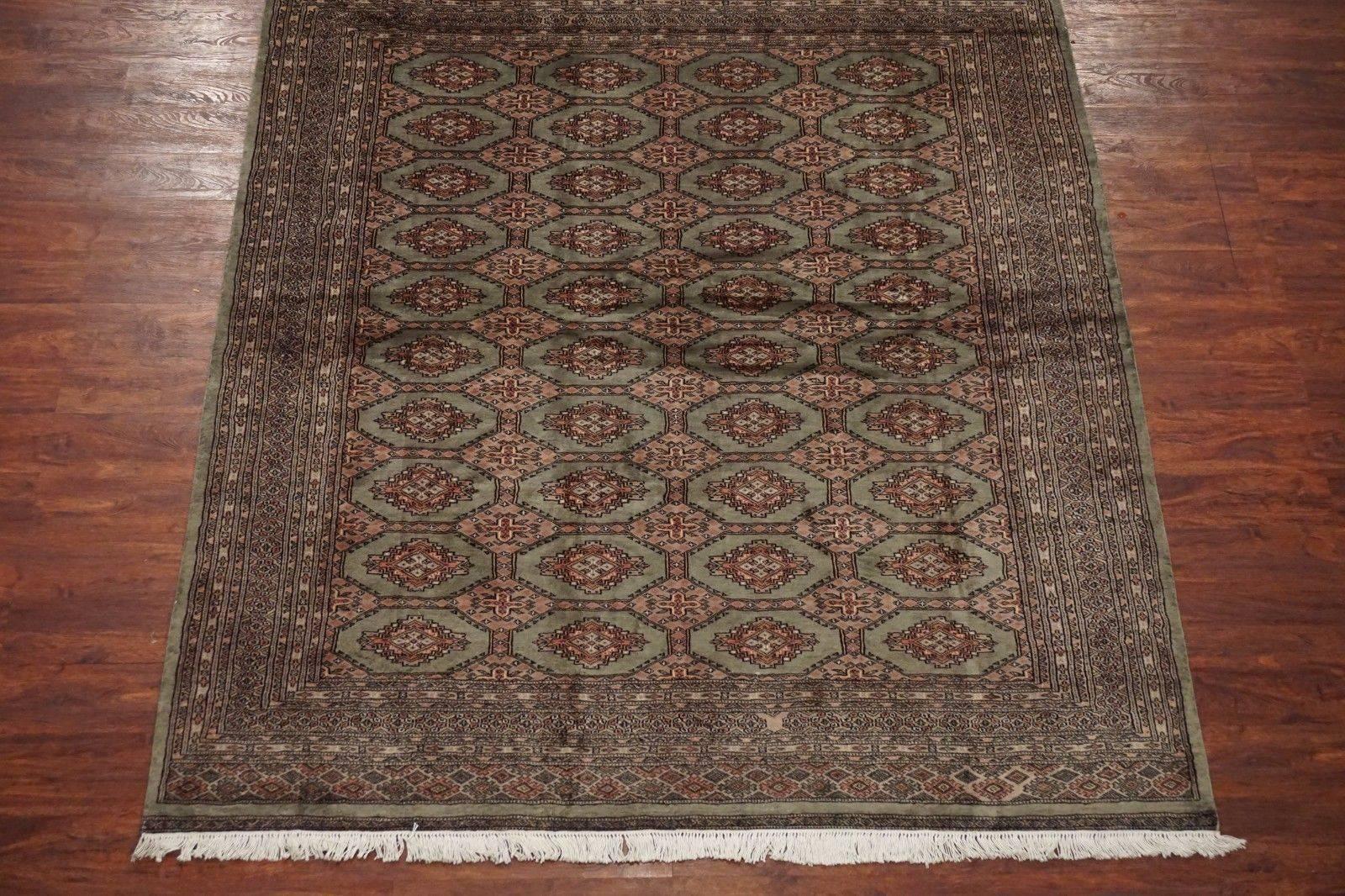 Signed wool and silk Pak Bukhara Area rug

circa 2015

Measures: 6' 9