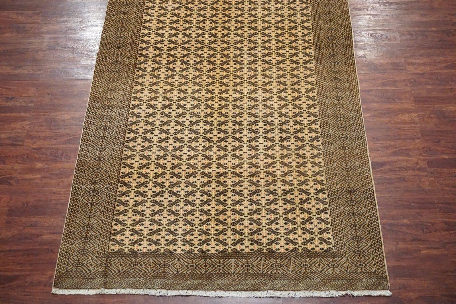Beige Persian Turkoman rug

circa 1940

Measures: 6' 7