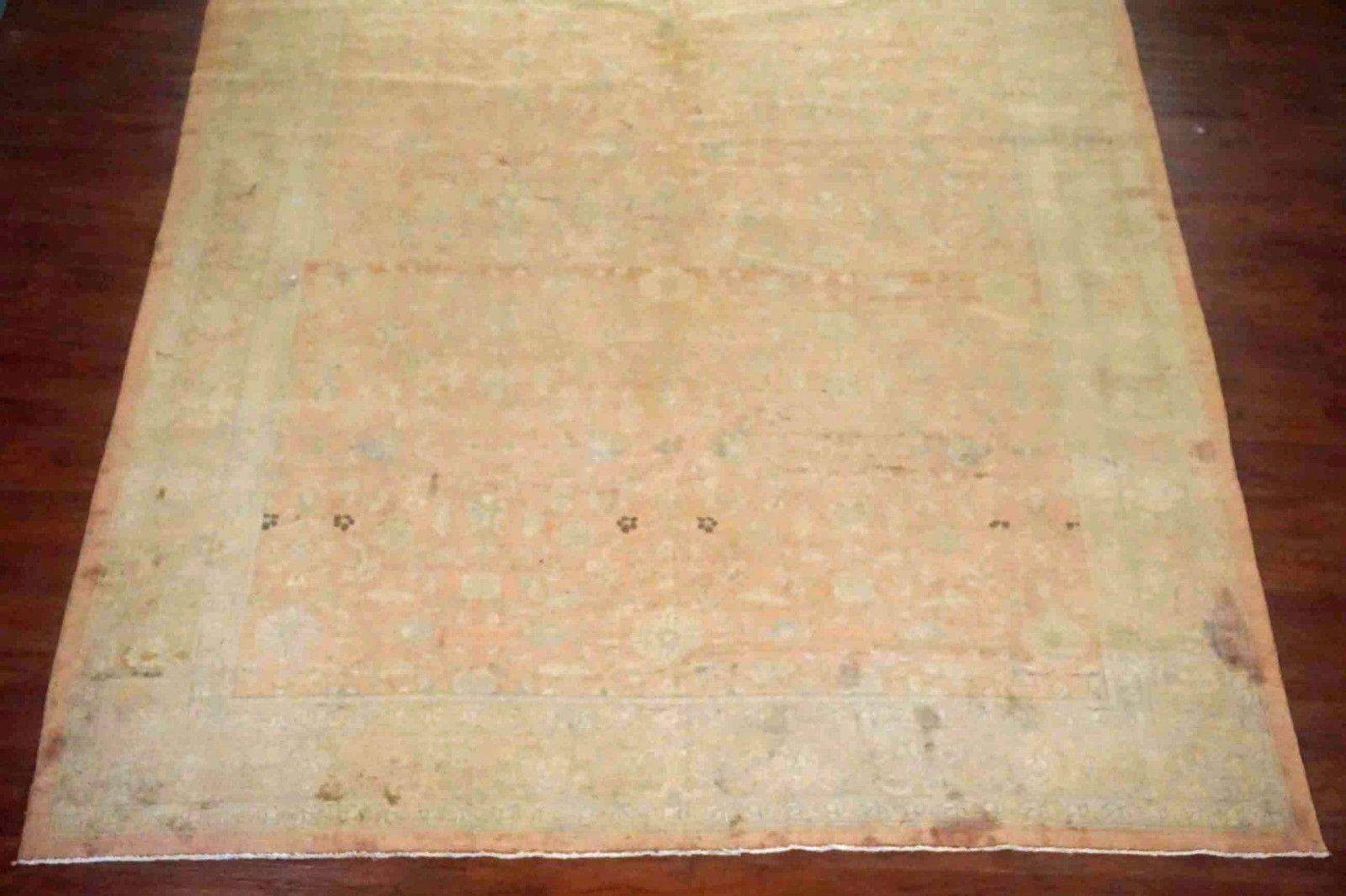 Dusty-rose antique Indian rug, 

circa 1900

Measures: 9' 11