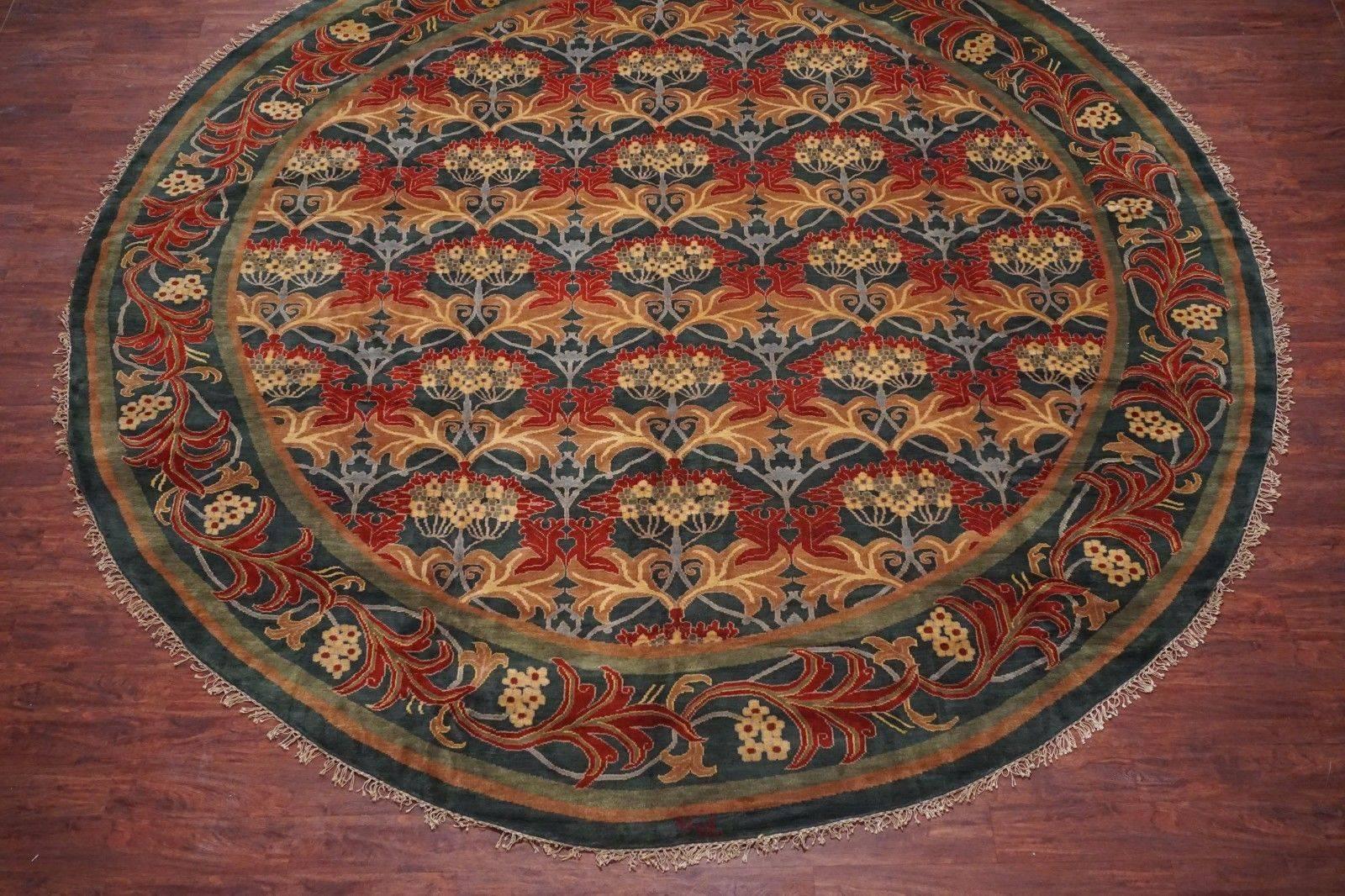 Round William Morris Inspired Rug, signed by weaver,

circa 1990

Measures: 13' 8