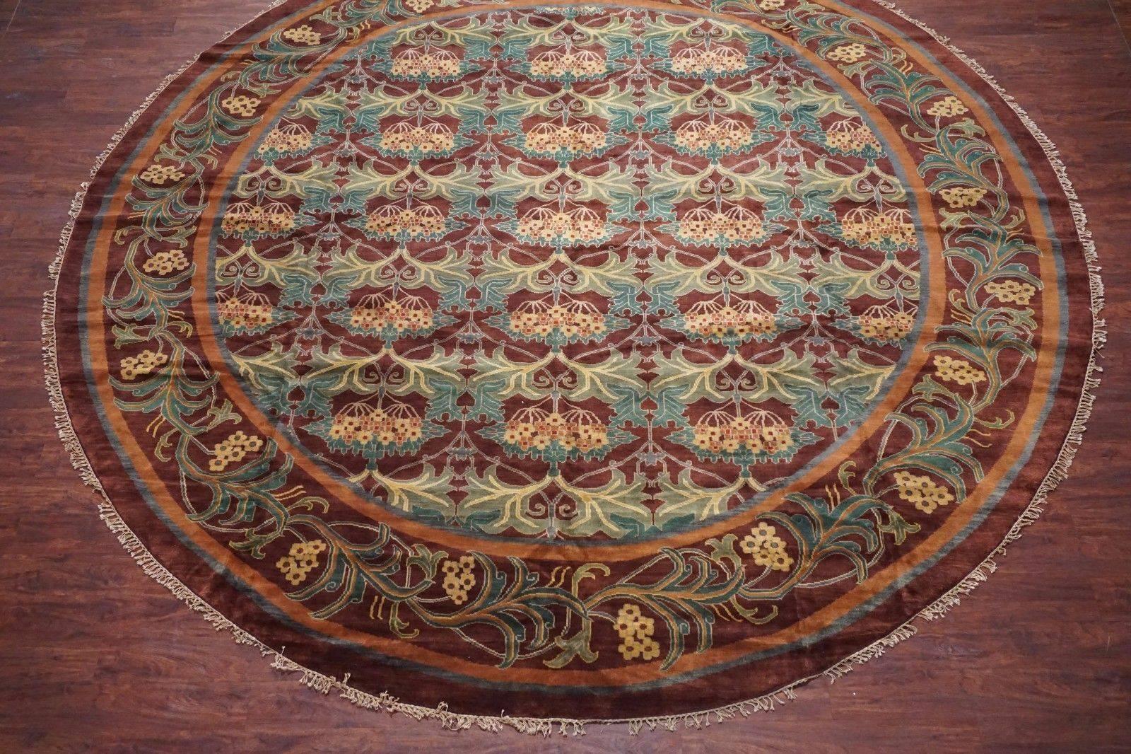 Round William Morris style rug, signed by weaver. 

circa 1990

Measures: 13' 9