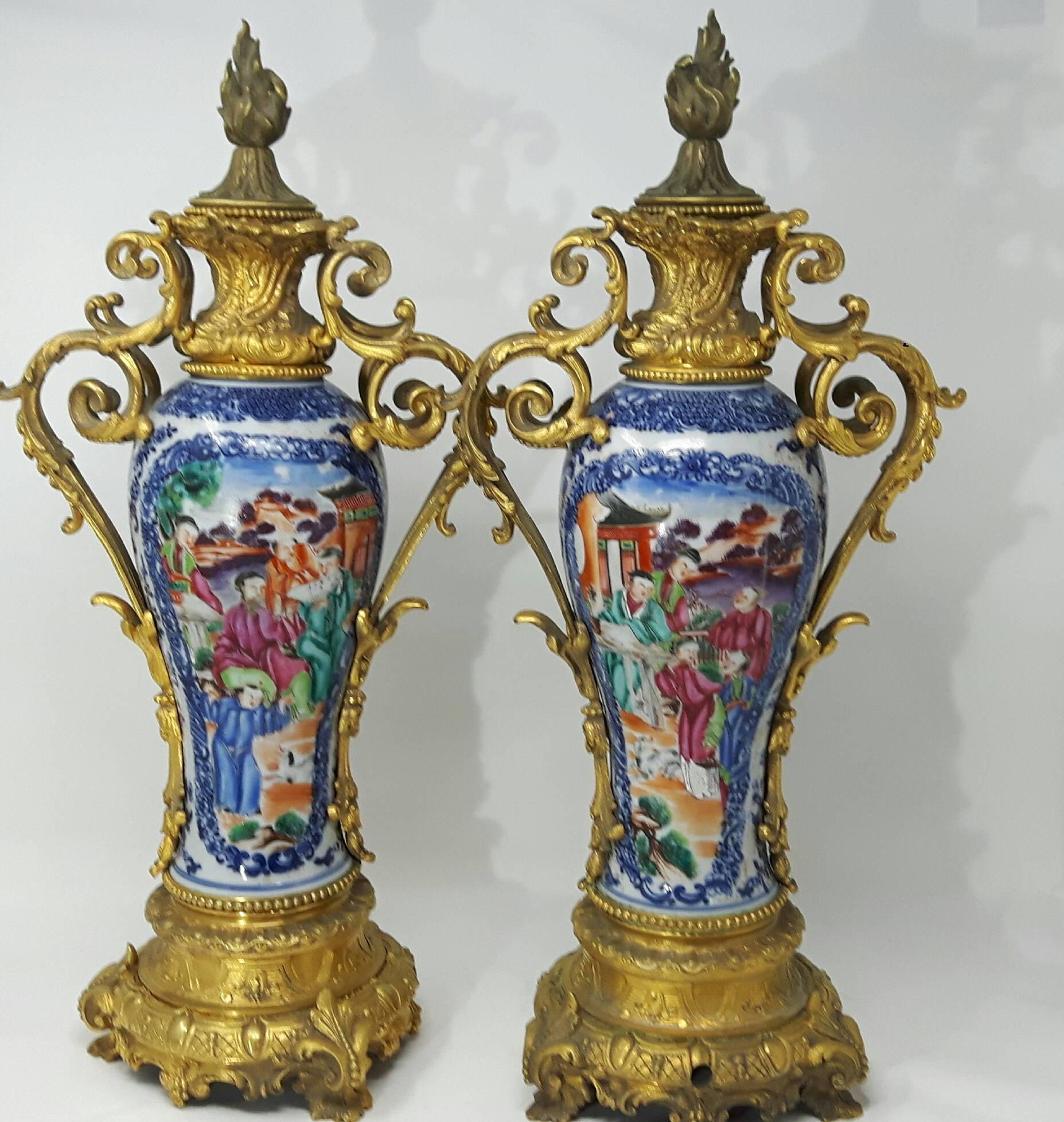 18th century ormolu-mounted Chinese export mandarin vases.
Each vase painted with figures in mandarin pallet.