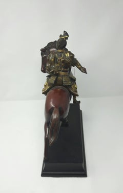 Gilt Bronze Figure of a Warrior on Horse Back