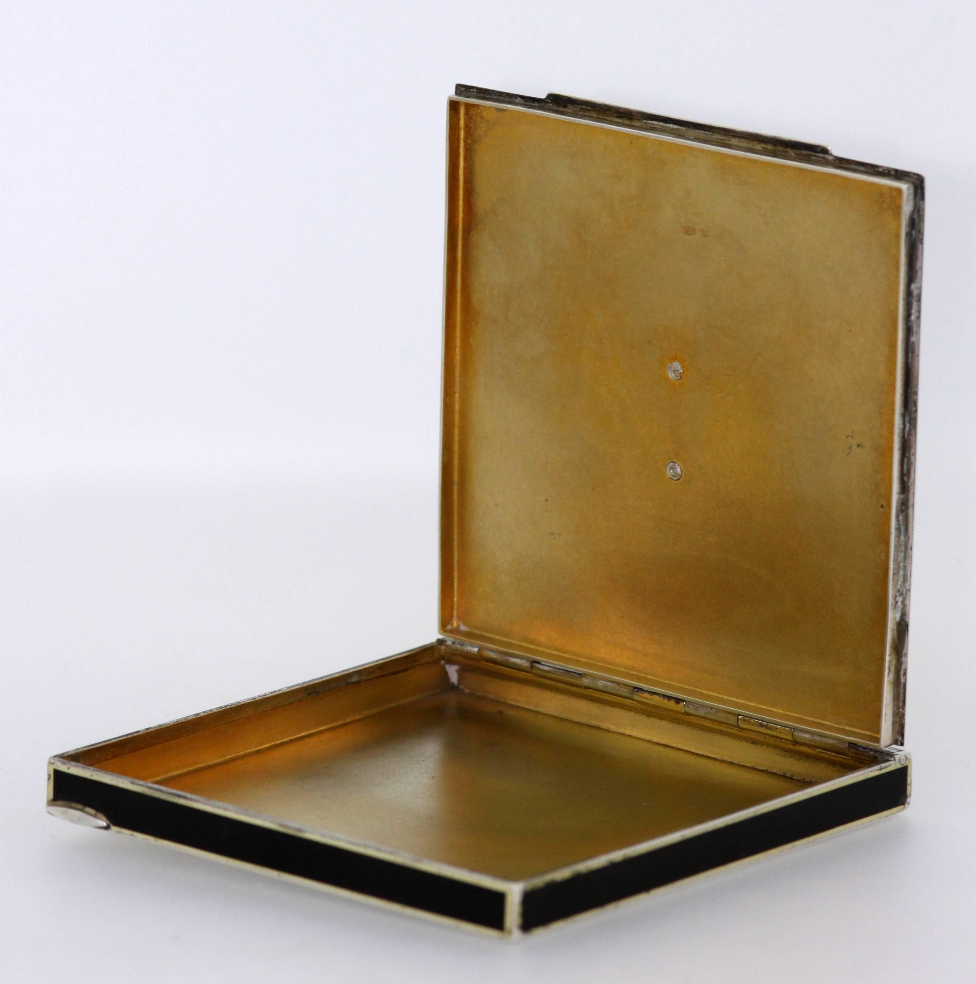 Art Deco sterling silver and enamel cigarette box
Maker: AJ
London Import 1934
Fully hallmarked

Dimensions: 
Size: 8.3 x 8 x 0.8 cm
Gross weight: 92 grams total

Condition: Minor surface wear from general usage, enamel no damage, excellent