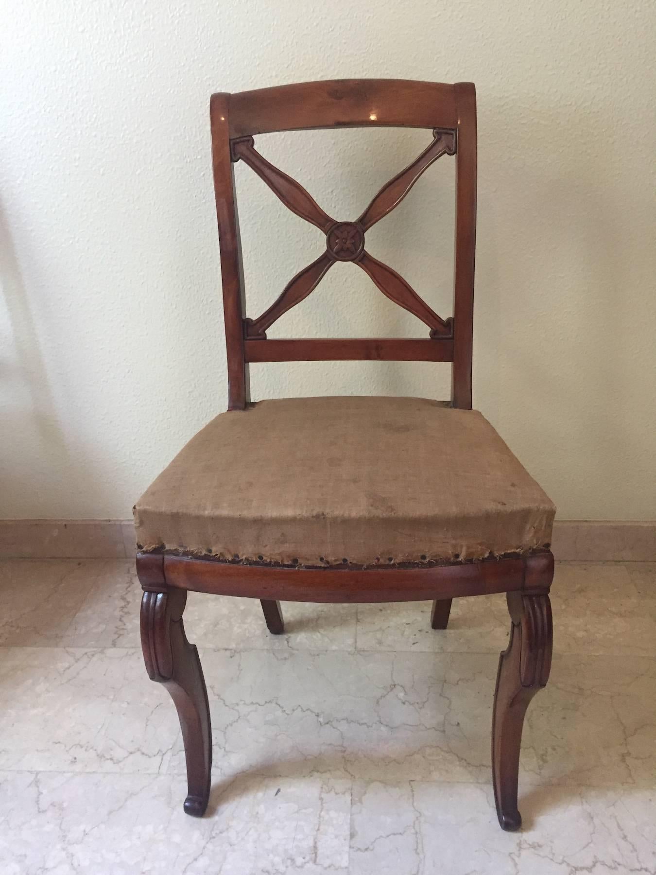 Beautiful  chairs in walnut with cross decorated backs and a flower in the centre, splendid front legs with sublime sculptures, sabre shaped back legs perfectly restored, they still have their original padding.Great executive quality ,they can be