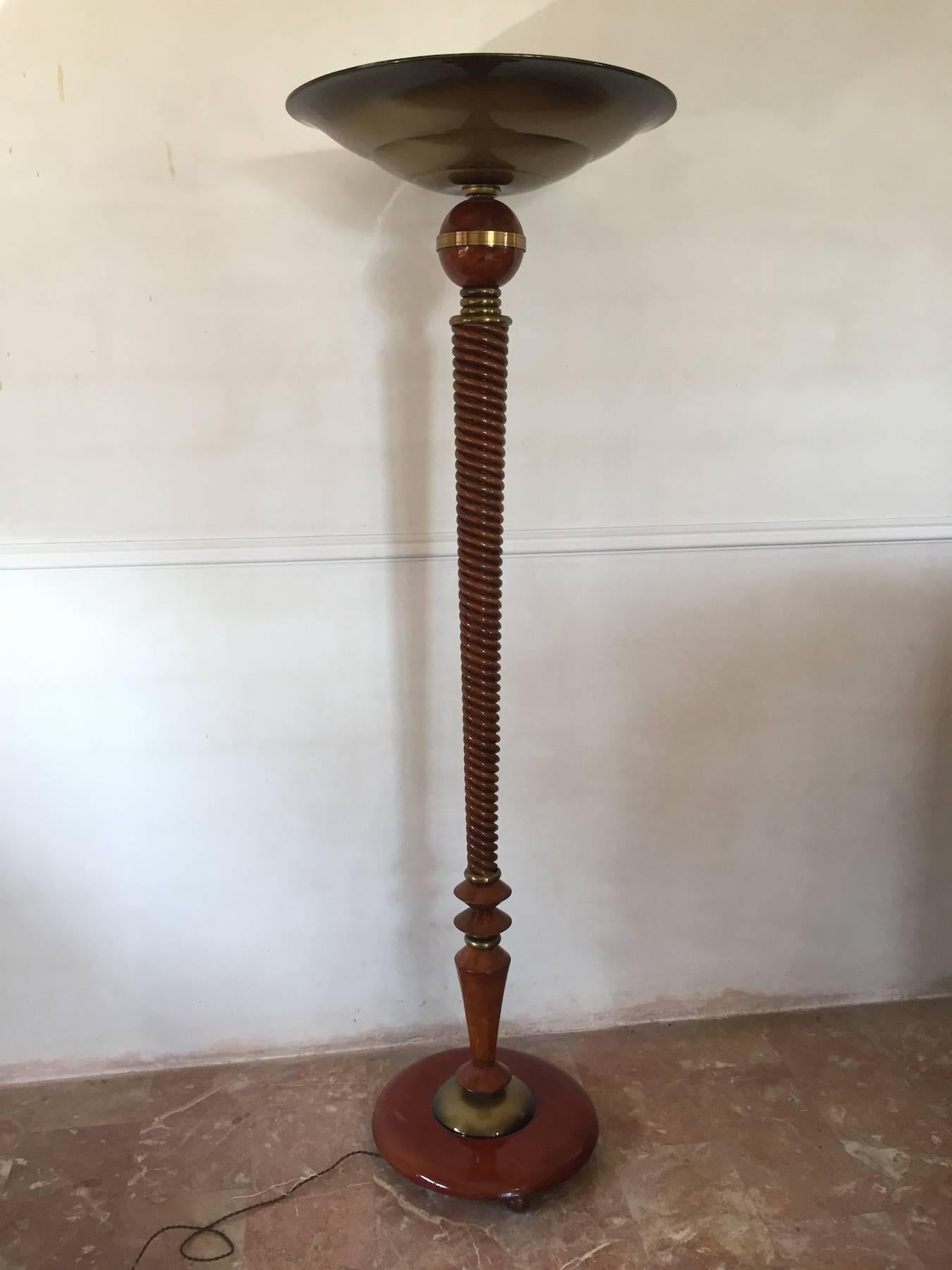 Unique French Art Deco standard lamp, beautiful wood shaft design, superb brass decorations, circular base.
