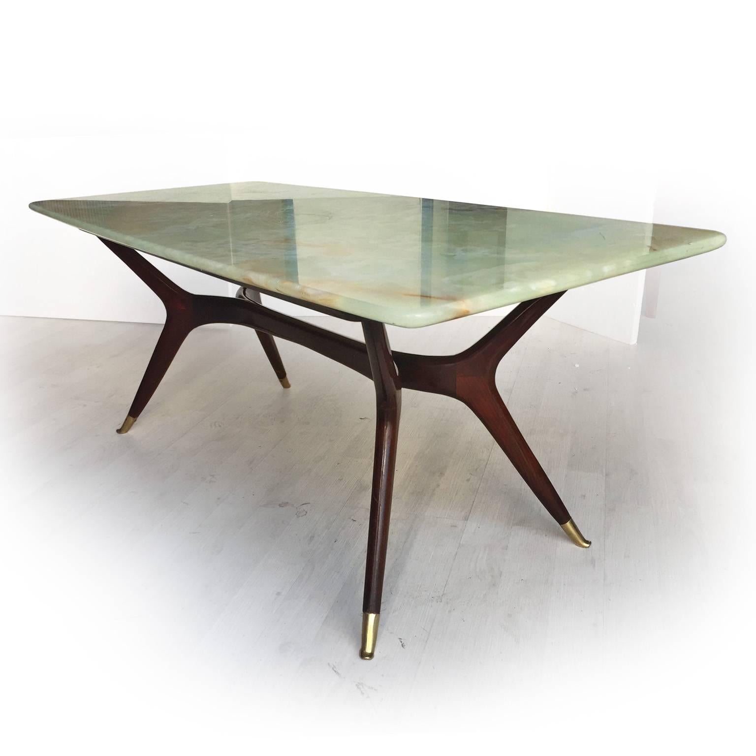 Stylish and rare lounge table attributed to Ico Parisi, with tabletop in light green Pakistan onyx, very rare marble chosen by the most important designers of the 1950s to increase the value of their furniture.
In excellent conditions of the period,