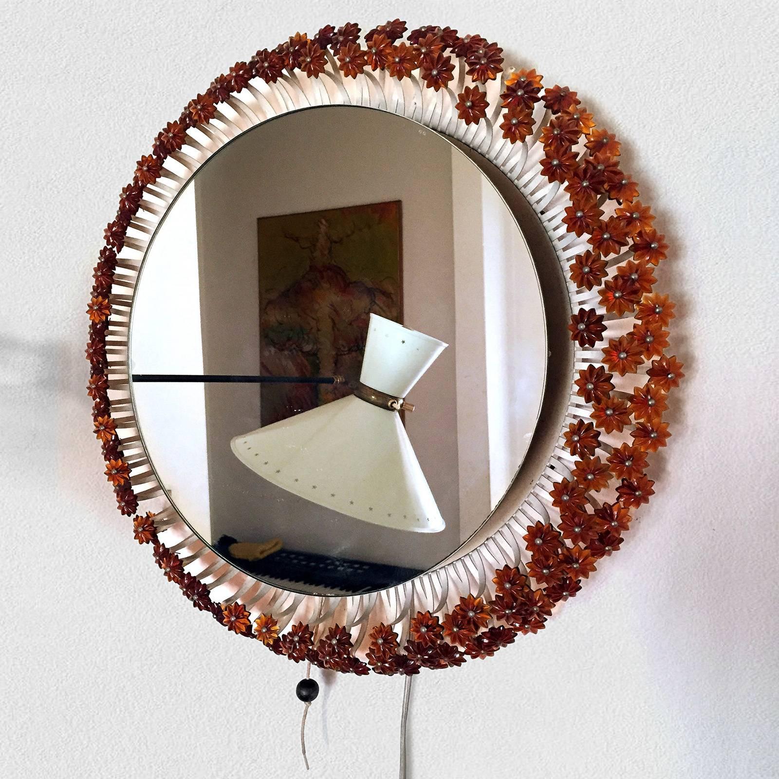 This stylish and charming backlit mirror was designed by Emil Stejnar for Rupert Nikoll in the 50s for the famous coffeehouse 