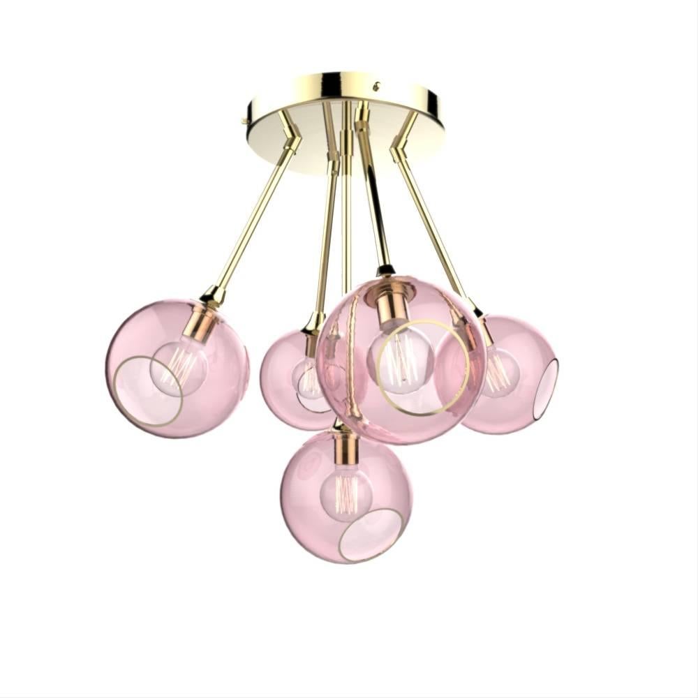 Danish design from Design by Us

The ballroom molecule chandelier features five spheres, available in different translucent hues, they merge in a unique atom shape to form a dazzling molecule!  

Mouth blown and hand-painted glass with brass