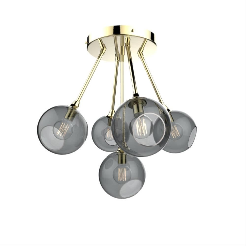 Diseño danés de Design By Us

La lámpara de araña Ballroom Molecule presenta cinco esferas, disponibles en distintos tonos translúcidos, que se fusionan en una forma atómica única para formar ¡una deslumbrante molécula!  

Vidrio soplado y pintado a