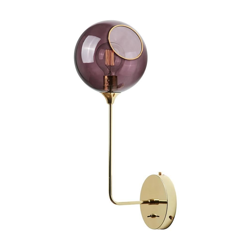 Danish design from Design by Us

The spherical ballroom sconces with translucent hues will create a subtle warm glow in your interior.

Material: Mouth blown and hand-painted glass with silver painted edges.

The lamp is only for direct wall-mounted