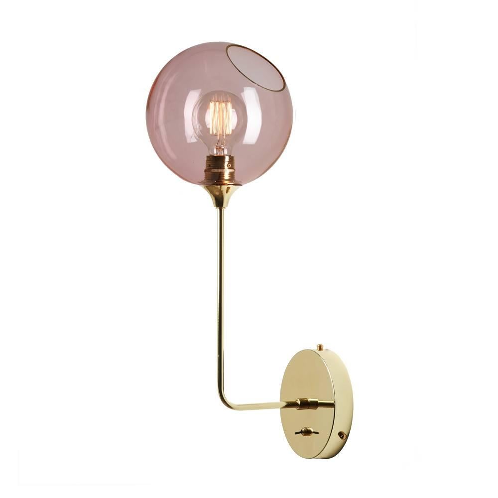 Danish design from Design by Us

The spherical Ballroom sconces with translucent hues will create a subtle warm glow in your interior.

Material: Mouth blown and hand-painted glass with silver painted edges.

The lamp is only for direct wall-mounted