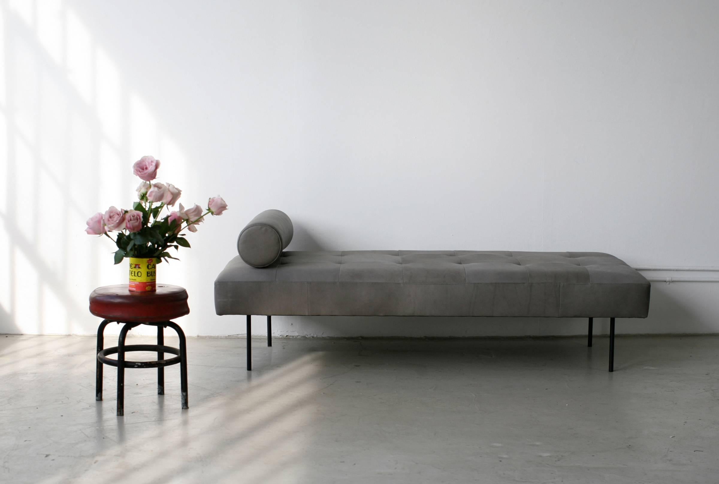 Smaller than a sofa, but bigger than a bench, the Goddard daybed functions as both when needed. It takes its form from 1950s French Industrial design, maintaining a sense of lightness and geometry. With a removable bolster and powder-coated steel