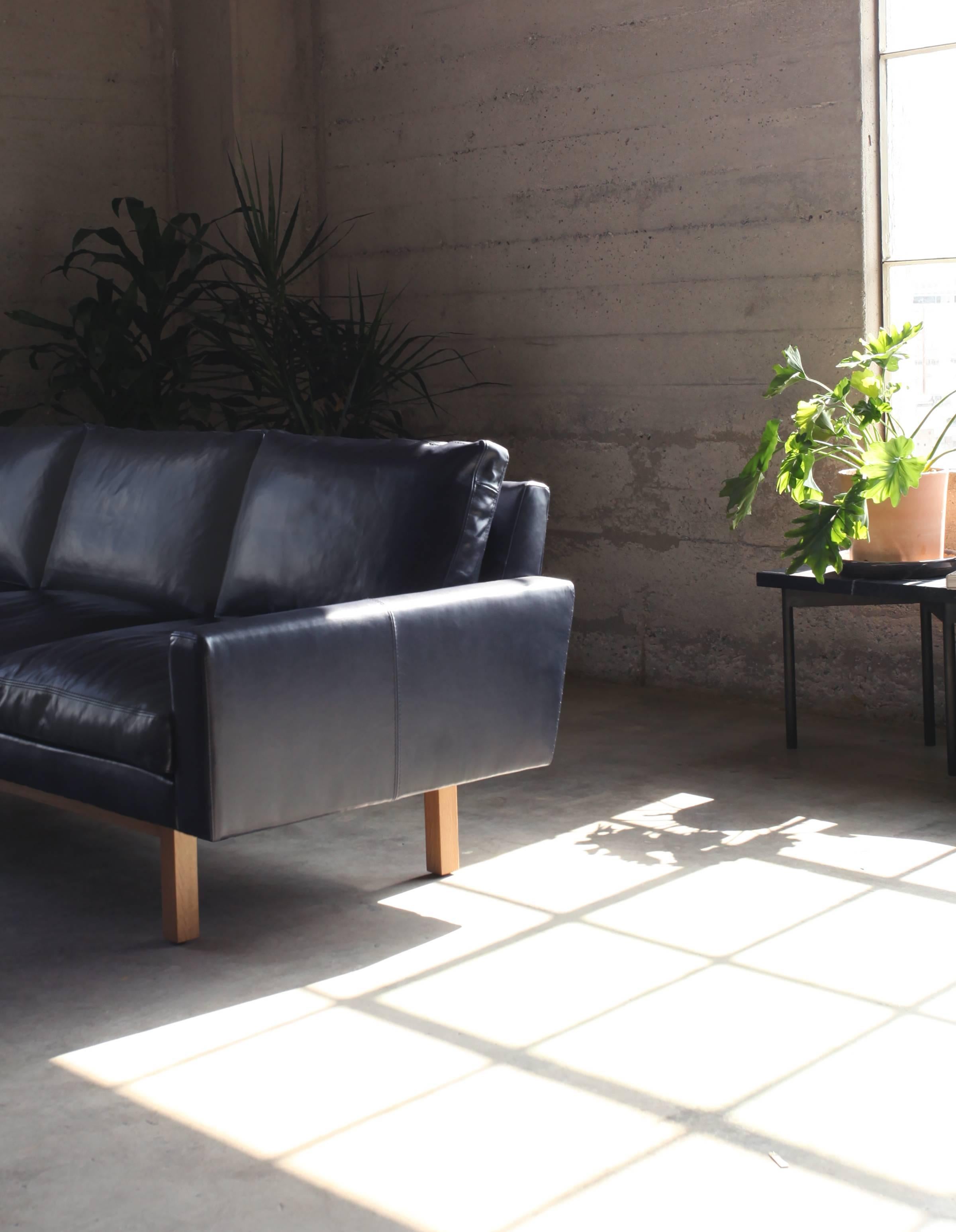 Contemporary Medium Standard Sofa in Black Leather with Brass Base In New Condition For Sale In Los Angeles, CA