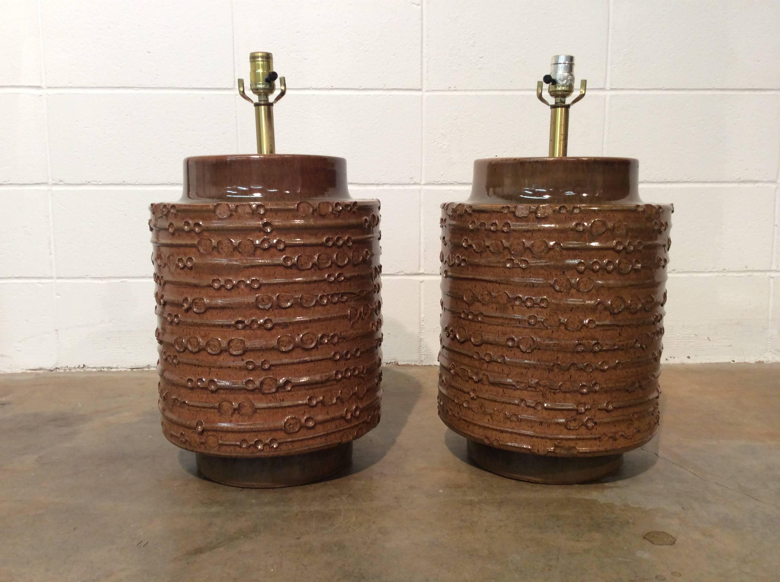Two extra large matching table lamps designed by David Cressey. Lamps were acquired from the original owners and are in above average condition. There are no noticeable defects in the ceramic. The wiring is assumed to be original and is in excellent