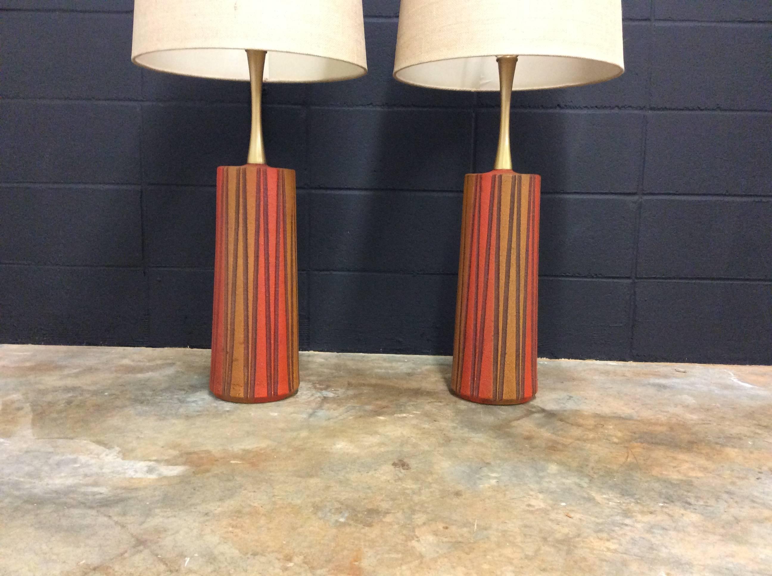 Bold pair of Mid-Century Modern table lamps with amazing colors. The lamps are vintage but have new wiring, new sockets, and new shades lamps are in great condition with very little signs of use. Signed K-21 on the bottom. Lamps are ready for