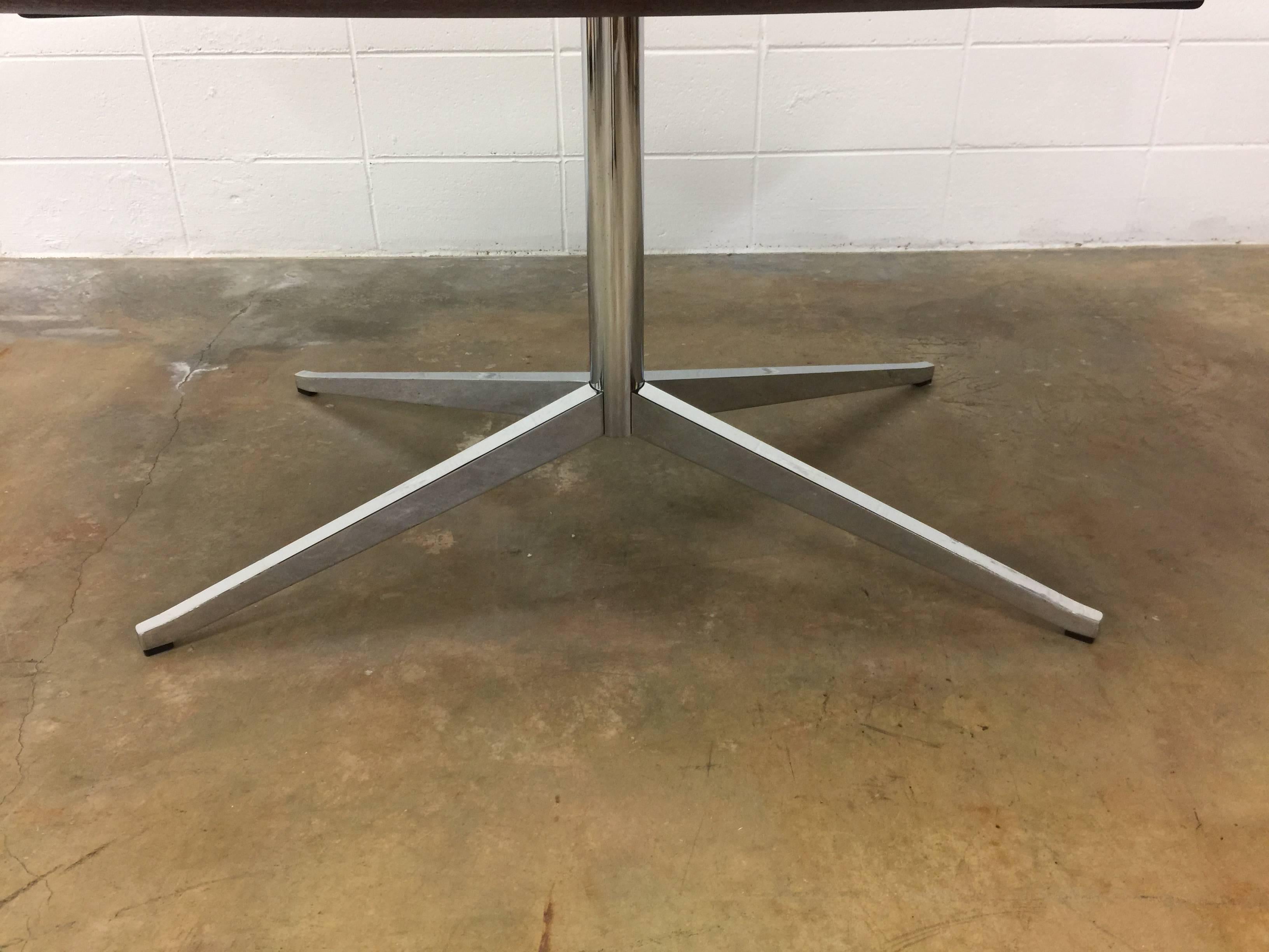 2480 pedestal table desk, circa 1961 for Knoll. 

Beautiful walnut and chrome table that can used as a desk or a dining table. Tabletop has been restored and looks great. Legs have some chrome finish loss. Those areas have been touched up to