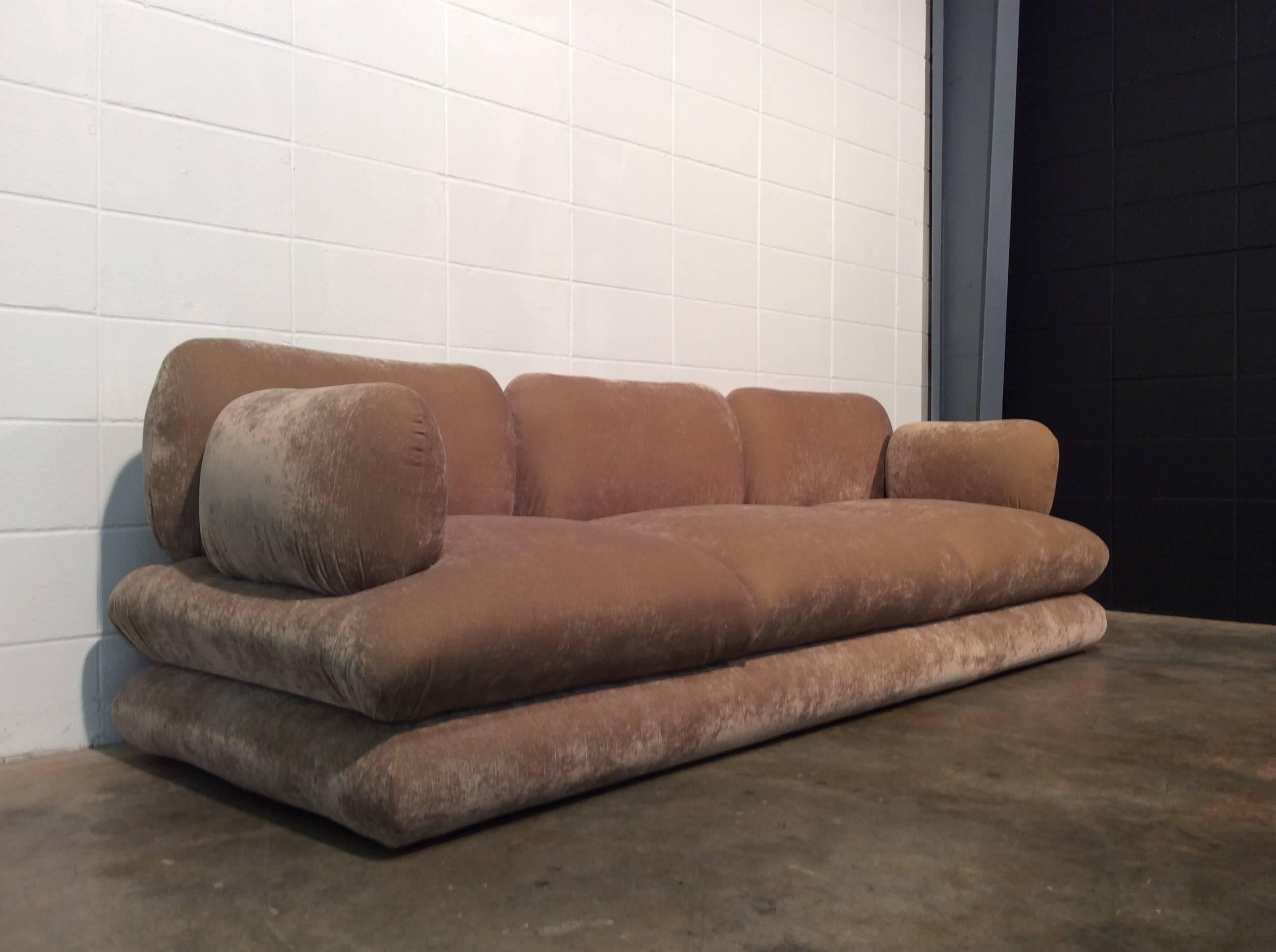 Mario Bellini style Mid Century Modern sofa tagged imported by Weiman. The sofa has been newly upholstered in a Cognac colored velour. It is very soft to the touch and comfortable. 
No known issues. Ready for use.