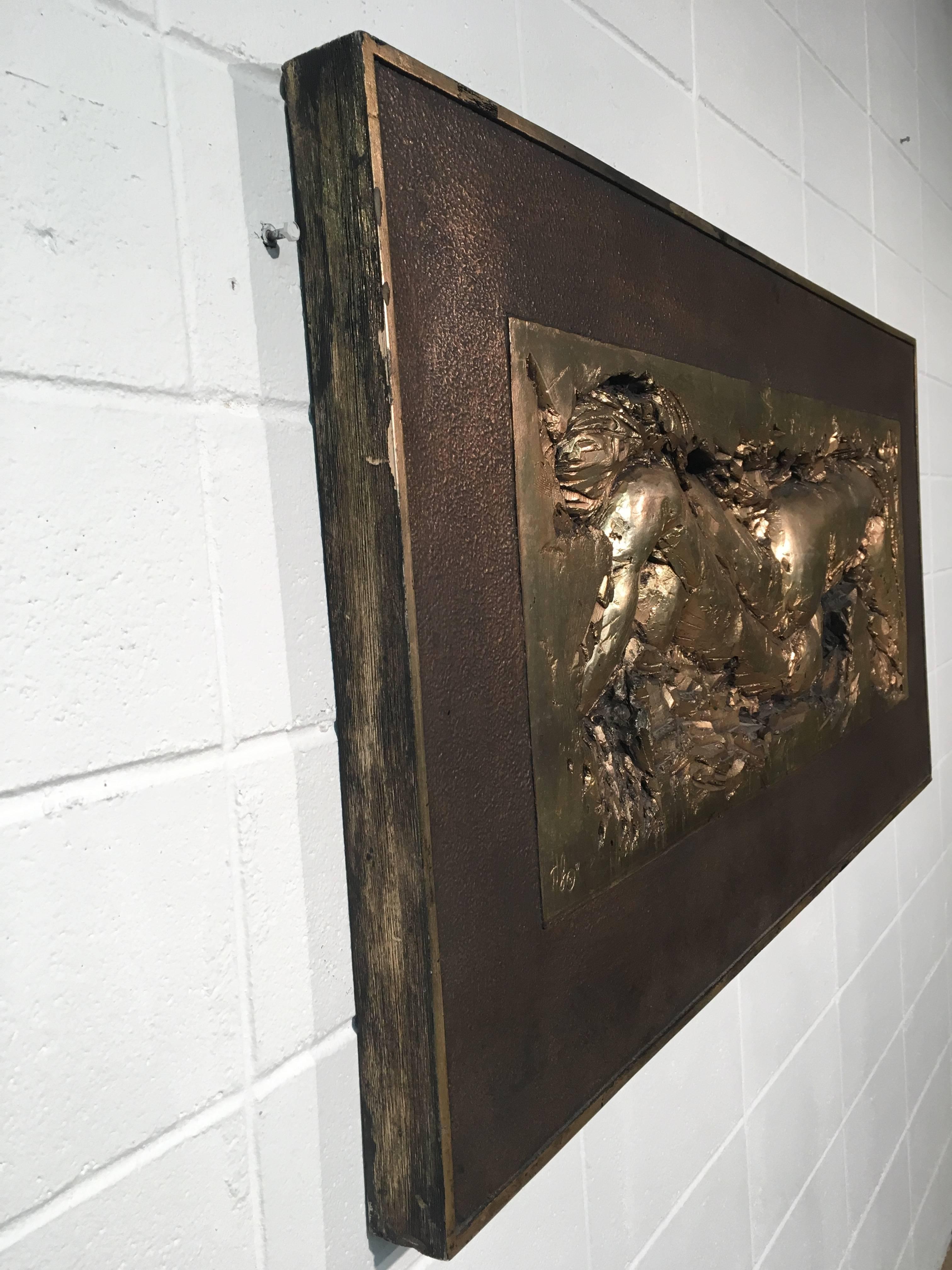 Stunning large-scale wall sculpture of a nude figure. Cast resin colored in bronze tones. Signed and dated 71'. Very interesting and unique. Great vintage condition with only minimal wear. There are no known issues that would detract from aesthetics