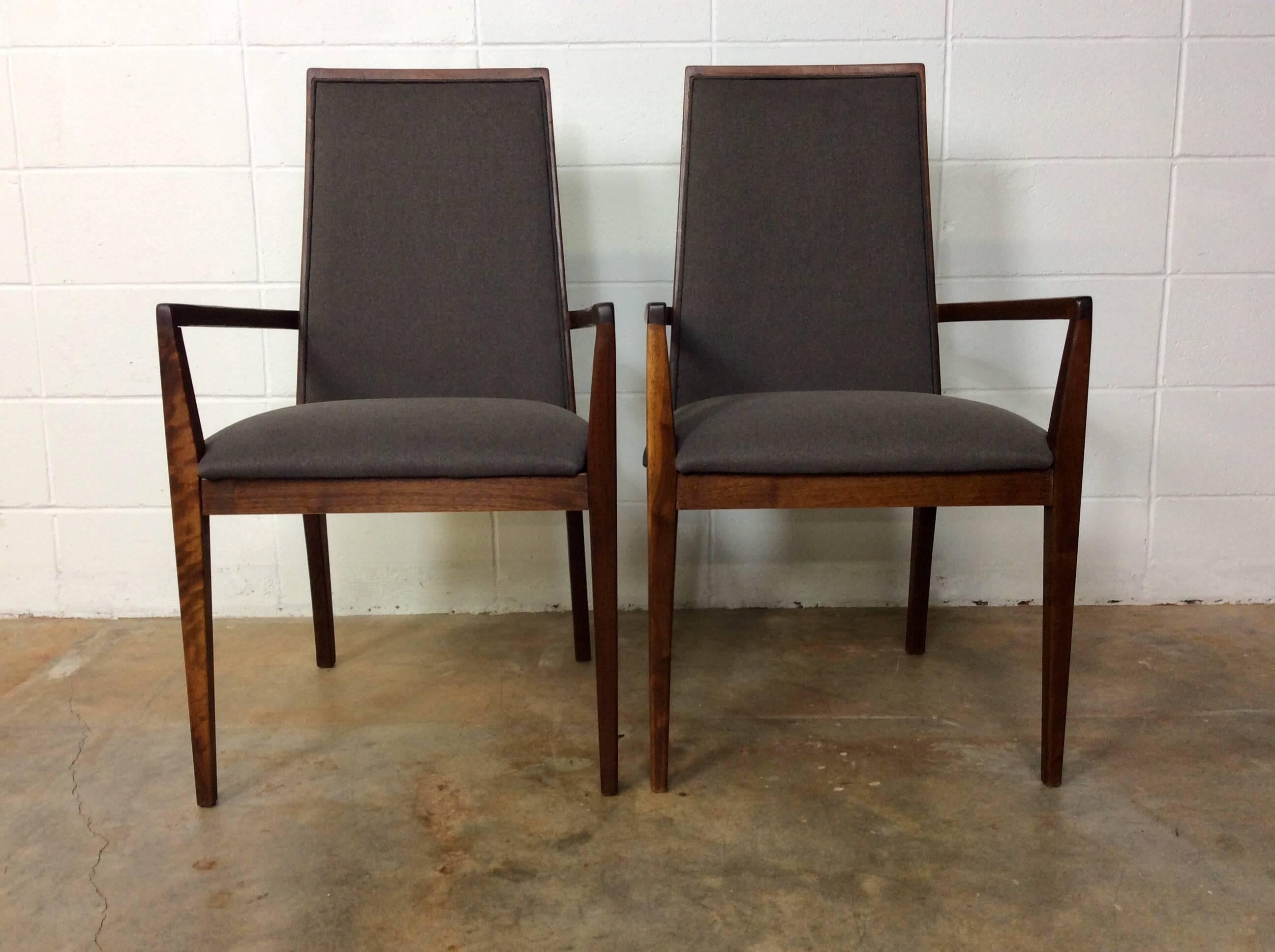 Set of four Mid-Century Modern dining chairs manufactured by Dillingham. There are two side chairs and two armchairs. This design is often attributed to Milo Baughman or Merton Gershun. While we cannot confirm who actually designed them, we can