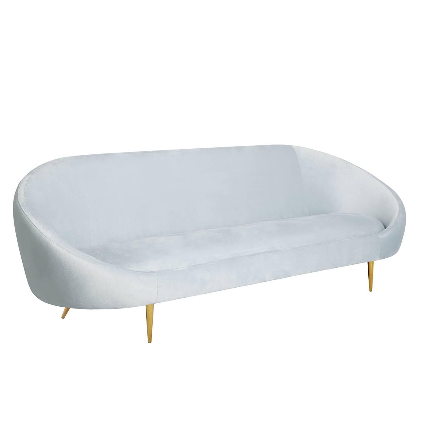 Heaven sent. The Ether sofa has a simple genesis story: JA wanted to create a sofa that looks and feels like heaven. The lozenge-like silhouette is enveloping and inviting, while gleaming brass stiletto legs project posh presence. Ethereal yet edgy,