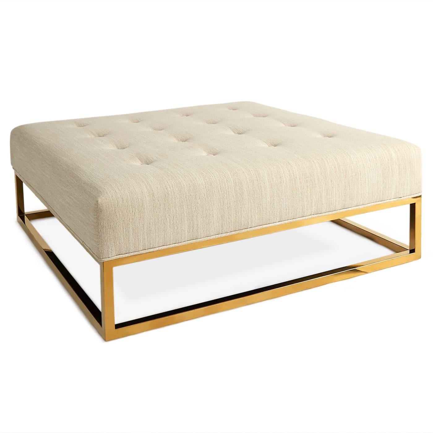 New Traditionalism. Modern Minimalism meets Traditional English in our Caine Collection. The polished brass base, mitered seams and tufted Roma Oatmeal upholstery give our Caine Ottoman a regal vibe. Top with a lacquered tray for an instant coffee