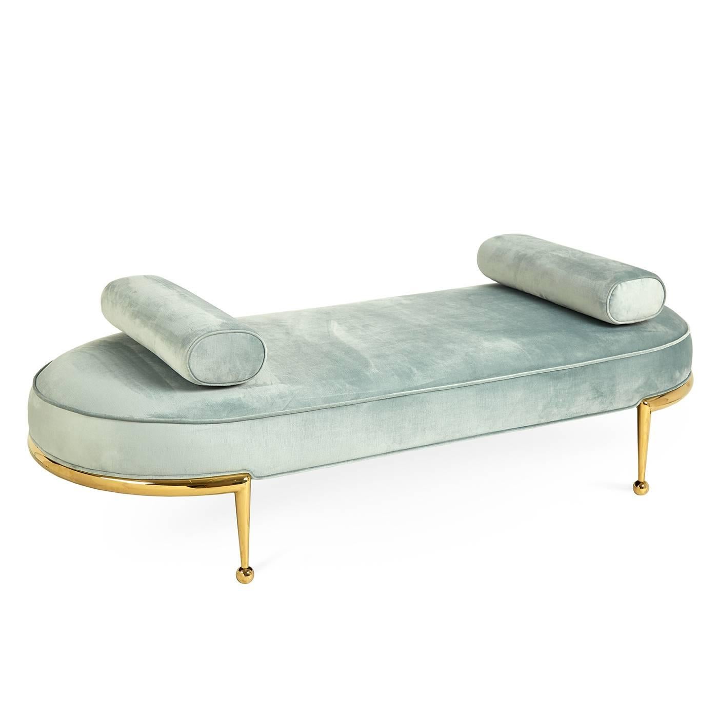 Power Player. An intriguingly sculptural brass base fitted with our signature sphere and cone legs cradles a lozenge-shaped seat upholstered in Bergamo Azure velvet. Weighted bolsters ensure you can recline without rolling over. Daybeds are every