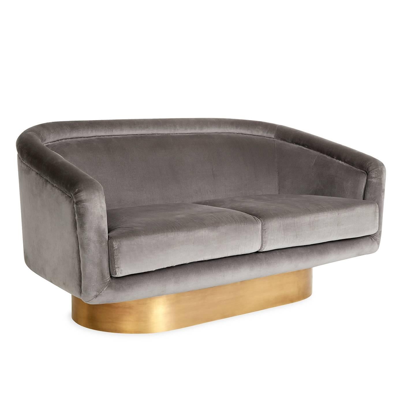 Louche glamour. Think Halston, think studio 54, think sybaritic style. But also think cozy, comfy settee. This petite sofa is fab in a foyer, at the foot of the bed or in a bedroom. The sleek and futuristic seat is upholstered in luxe Rialto Ash