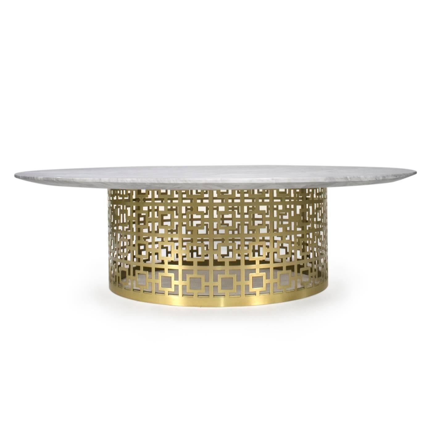 Graphic glamour. Our signature Nixon pattern rendered in perforated brushed brass provides a sophisticated perch for a solid white marble tabletop. Contact Dealer for additional finish options.

Specs:
Marble Top: 44 in. Dia x 1.75 in. H
Base: 26