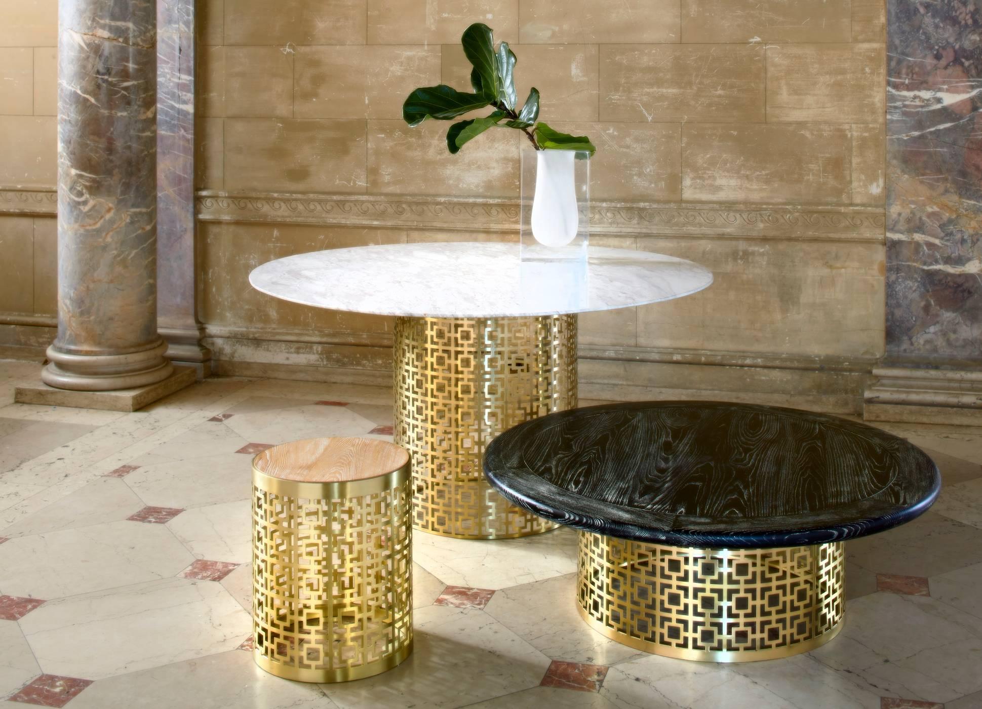 Graphic Glamour. Our signature Nixon pattern rendered in perforated brushed brass provides a sophisticated perch for a solid black marble tabletop. Contact Dealer for additional finish options.

Specs:
Marble Top: 44 in. Dia x 1.75 in. H
Base: 26