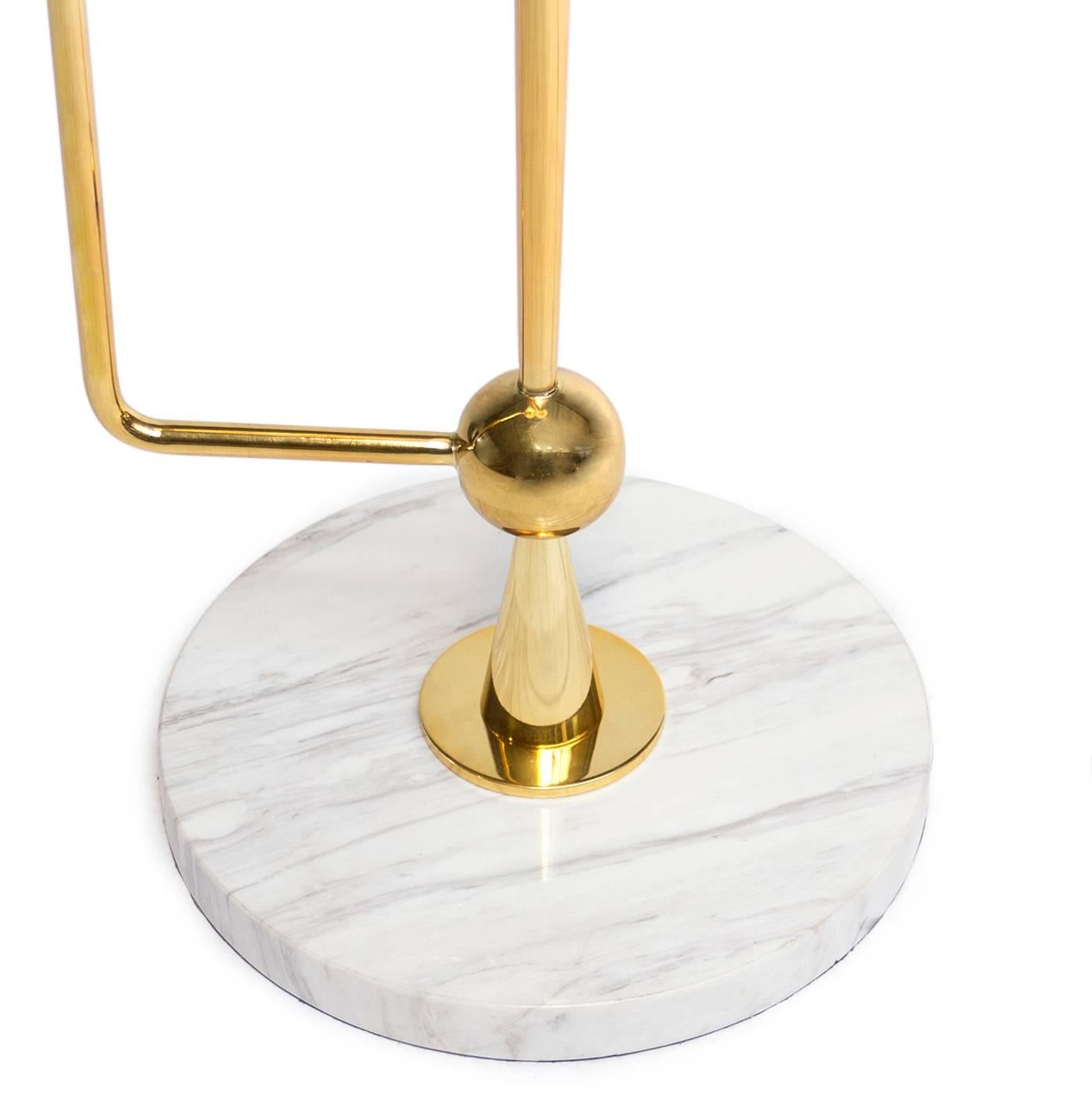 Kinetic Modernism. Sculptural and surprising with two different-sized shades. Simple geometric brass shapes—cones, spheres and rods—collide with dynamic results in the abstract stem, which is complemented by the elegant marble base and nifty pull